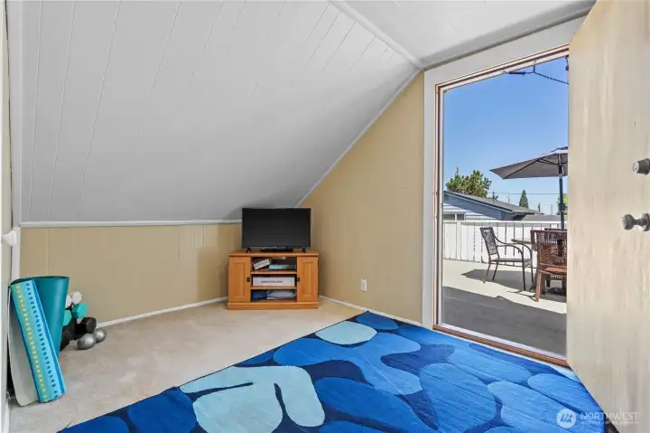 Fourth bedroom has access to the rooftop deck.