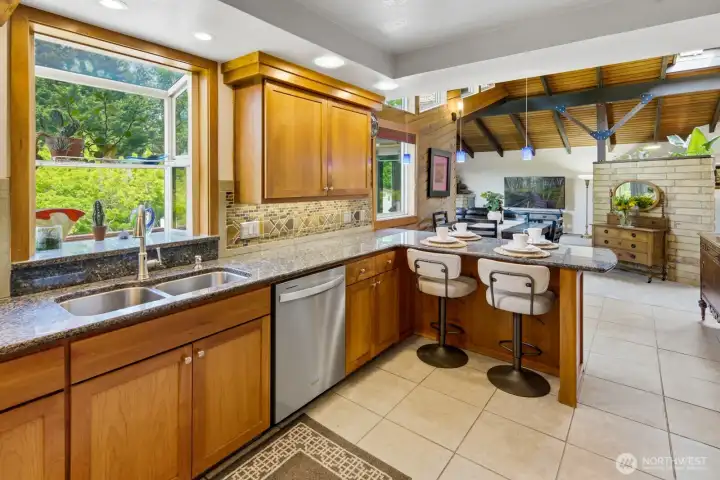 Gorgeous tray ceiling and custom lighting including under cabinet lighting