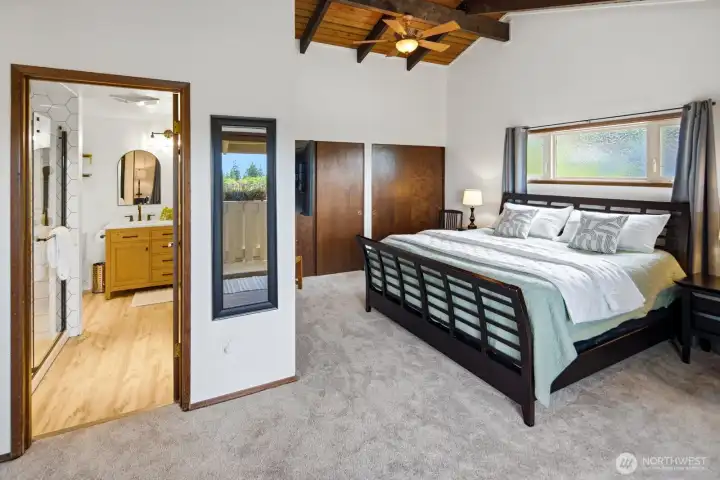 Beautifully updated Primary Suite with generous walk-in closet, 2 additional closets, and a spa-like ensuite bathroom