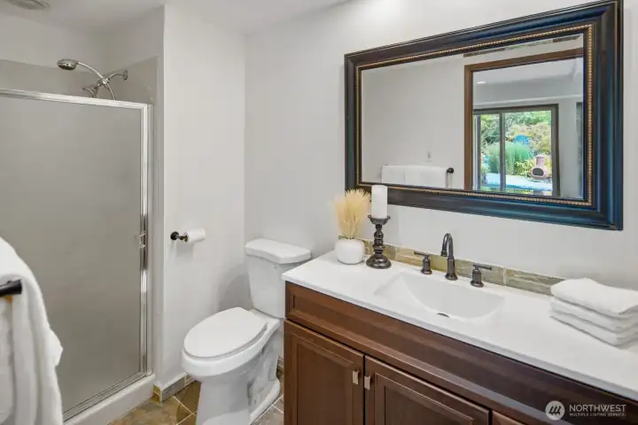 Lower level ensuite bathroom with walk-in shower