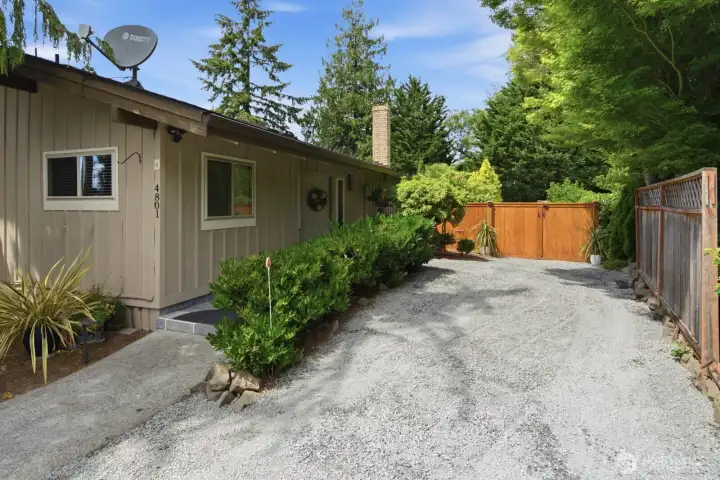 Additional parking and access to backyard from both sides of the house