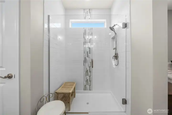 Walk in custom tiled shower.