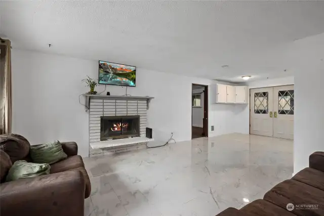 Gas fireplace and marble floor living room