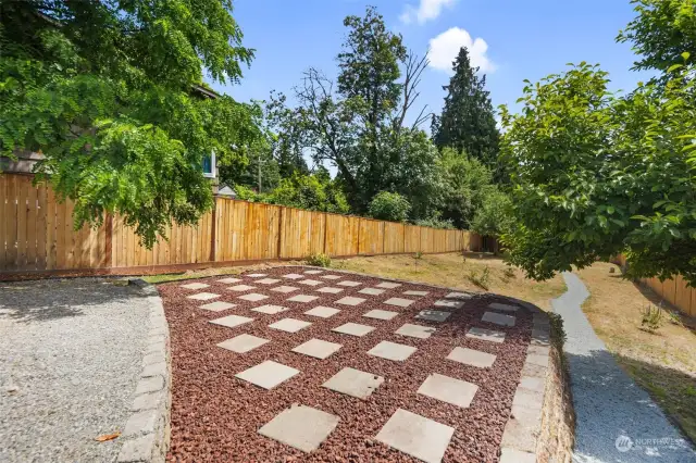 This terraced portion of the yard would be perfect for a fire pit and chairs.