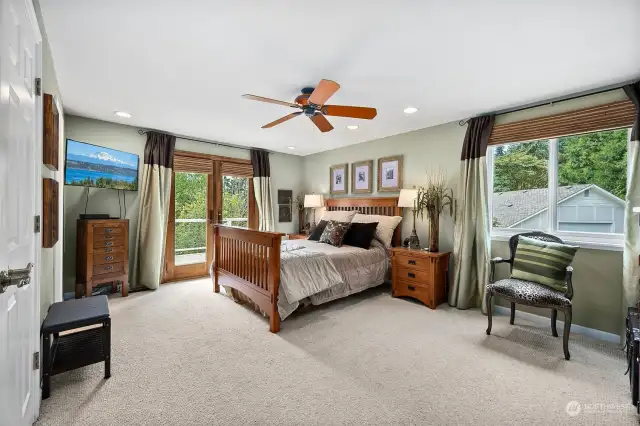 Primary bedroom with French doors to deck