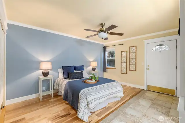 Primary bedroom with access to backyard.