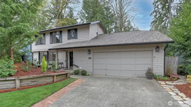 Discover the charm of this 2 story home in the sought after Fairwood Greens community. This residence offers a stylish kitchen featuring trendy blue cabinets, elegant granite countertops, a single basin sink, gold fixtures, and a new dishwasher. Enjoy beautiful LVP flooring throughout this home. Enjoy heat pump and central AC for year round comfort, plus a cozy wood burning fireplace in the living room. Step outside to the sprawling backyard perfect for gardening and relaxing. Situated in a prime location ensuring an easy commute to the airport, Renton Landing/Southport, and Bellevue, making it an ideal choice for convenience and lifestyle. Close to shops, dining, schools, parks, and King County Library system.