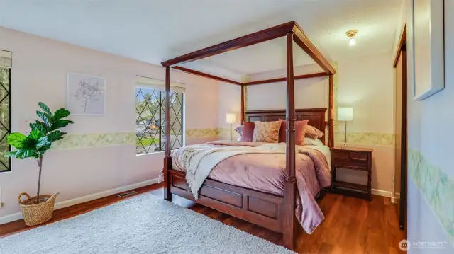 Upstairs boasts a large primary retreat with plenty of space for furniture and sitting area.