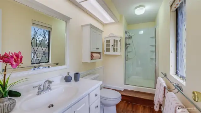 Enjoy a spacious 3/4 bath en suite in this primary.