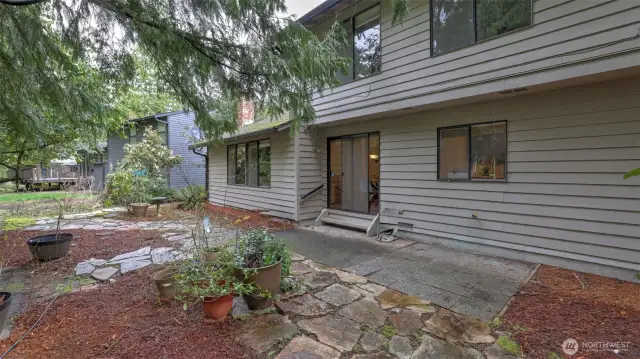 Serene backyard creates a great space for indoor/outdoor living all summer long.