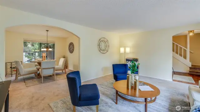 Dining room seamlessly connects to the formal living room, ideal for entertaining.
