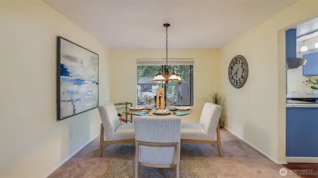 The spacious dining room is just step from the kitchen perfect for easy serving.