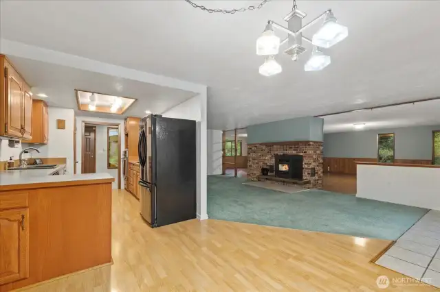 The cabinent space is functional with pull out drawer, solid oak kitchen.