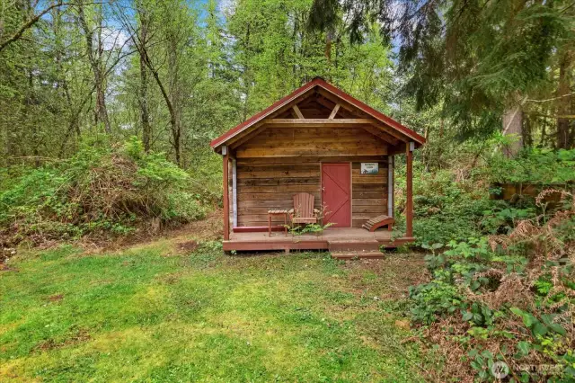 Charming hand built log cabin for playing, camping guests (think hip camp) so nostalgic, dreamy, playful and well built.