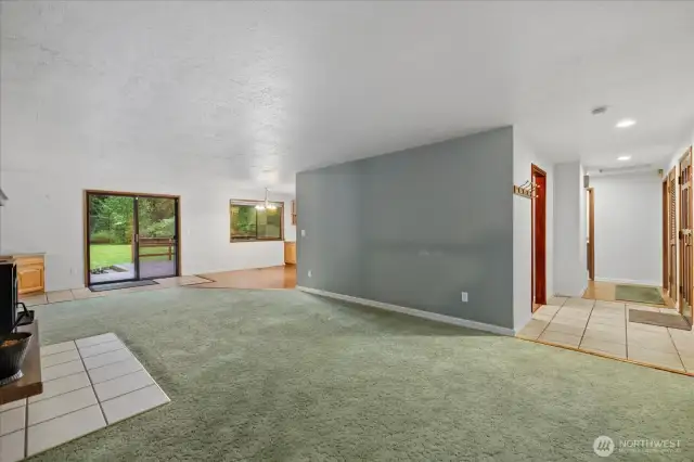 Lovely brick pellet stove is a great heat source. Foyer and hallway leads to 2 bedrooms.