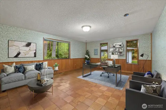 Whimsical windows in office, hardwood plank flooring.