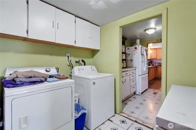 utility room with cabinets in the ADU