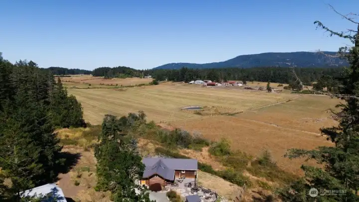 A birds eye view looking northeast and across the agricultural east side of Crow Valley. Mount Constitution as back drop.