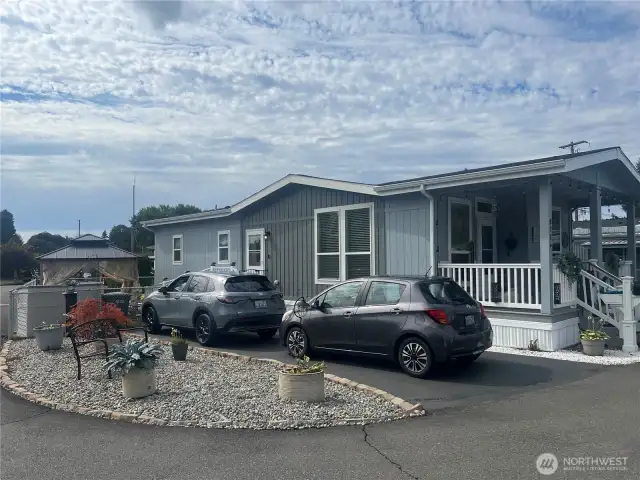 Large corner lot with new pavement and fenced yard.