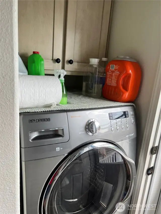 Utility room with storage and room for full size W/D.