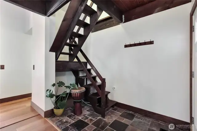 Entrance into condo and access to loft