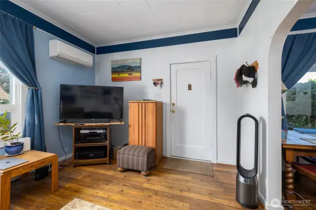 The living room and entry.