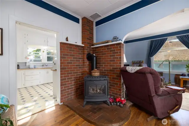 A propane (gas) stove will keep you toasty all winter without the hassle and messiness of a wood-burning stove.