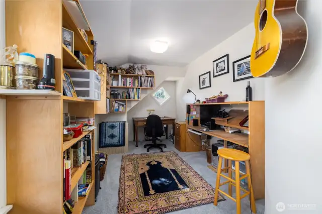 Another of the guest bedrooms upstairs, currently used as a home office. Would make a great den, library, study, or craft room.