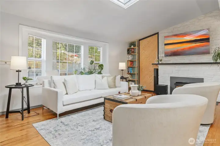 Livingroom has large bay window looking to front yard.