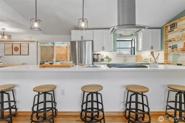 Designer pendant lighting, and gas cook cooking.