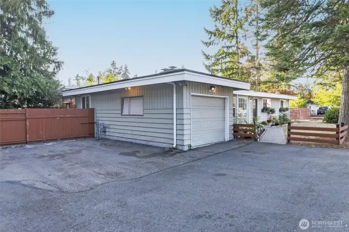 One car attached garage with bonus storage space. Plenty of extra off street parking.