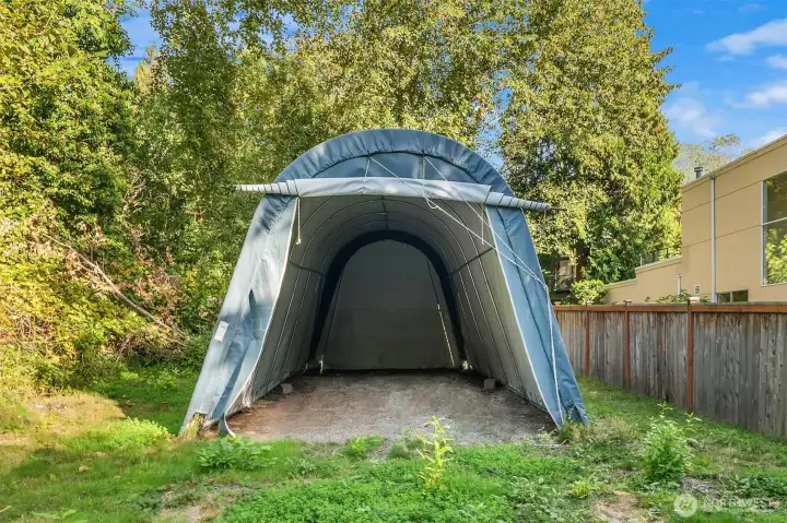 Property Extends Beyond the Fence through the Graded Area, including the Canopy Area (Canopy is Removable)