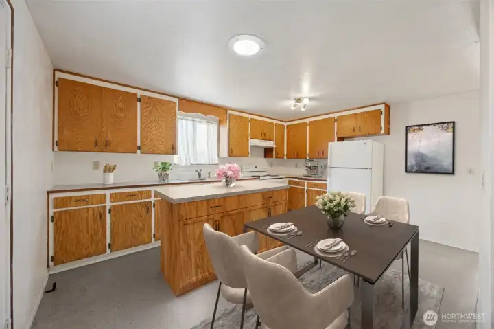 Huge kitchen with dining space and solar tube for added natural light.