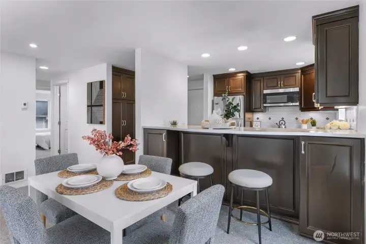 Open kitchen with breakfast bar.