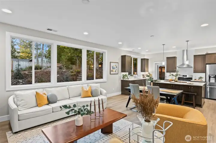 The great room with its garden backdrop is abundantly private and perfectly portioned for comfortable living.