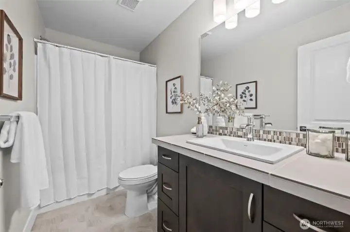 Full guest bath on the upper level