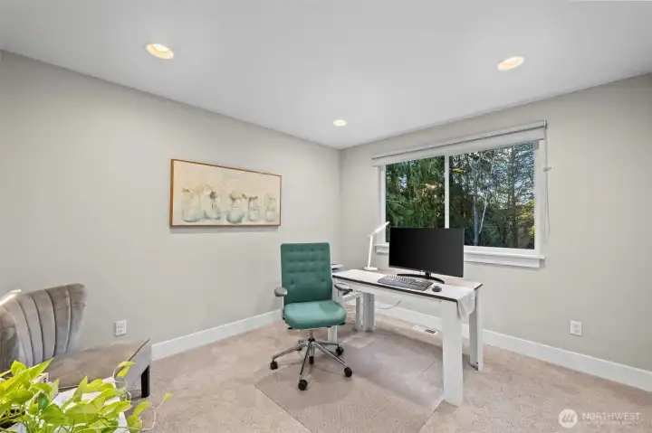 This western facing bedroom adjacent the loft (top of the stairs) makes an exceptional office because the view is always magical.
