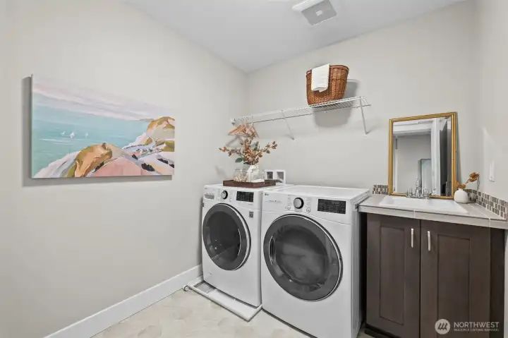 The laundry room is on the upper level and includes a sink