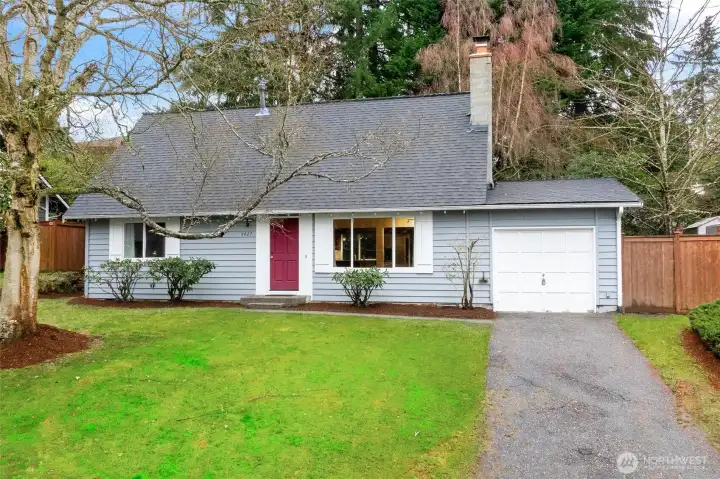 Charming curb appeal welcomes you to this well-maintained home