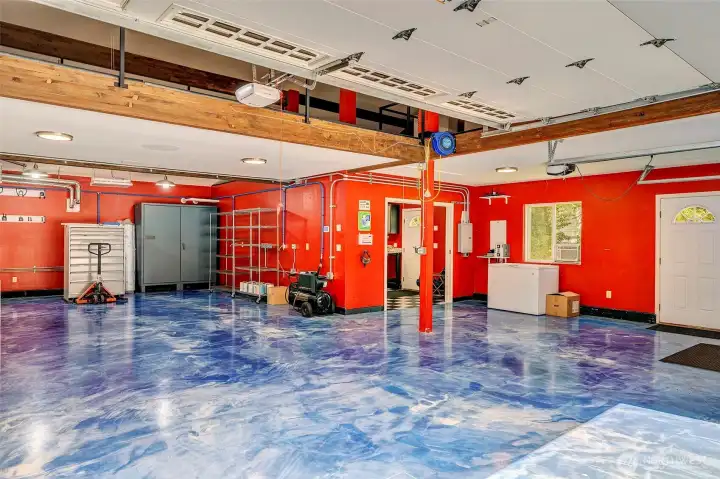 Huge detached Shop/garage .Gas heat. Air Compressor. wW-fi ready. On-demand hot water. Speaker system.Outside car wash station w/pressure washer. Loft. So many extras!