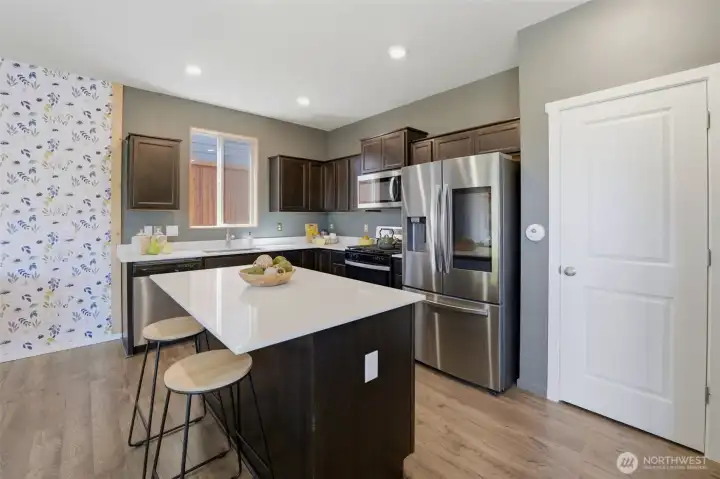Beautiful kitchen with eating space at bar