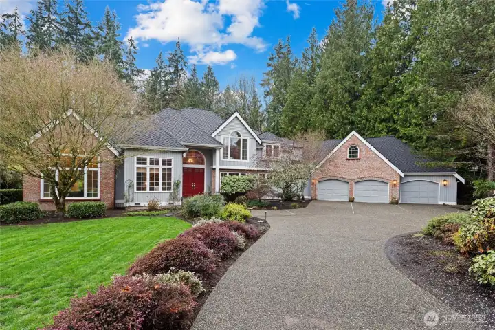 Elegant & idyllic, this 4BR, 2.5BA, 4,400 SF retreat sits in the sought-after Grousemont neighborhood, an exclusive enclave of stately homes on expansive estate-sized lots.