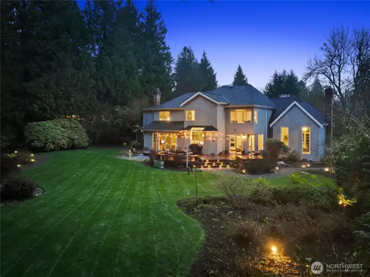 Set on over an acre, the private backyard offers a true retreat to create lasting memories with a spacious deck & patio areas.