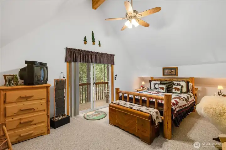 Vaulted ceiling and fan for the room.