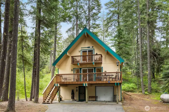 Chalet-style designed home and property a great mountain and lake retreat to get away, relax, and have some fun. A four season-base camp with year round access. Driveway in is all paved.