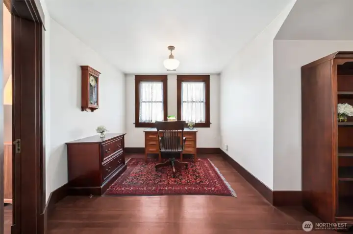 Top of the stairs with office space. Mater to the left. Two additional bedrooms to the right with full bath with tub.