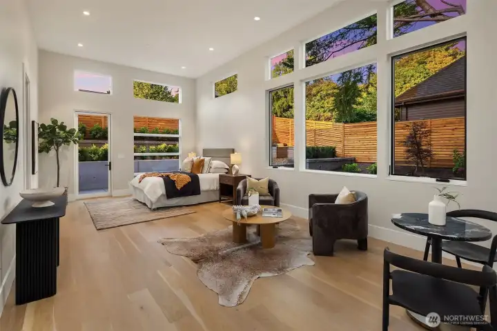Main level guest suite with kitchenette, sitting area, two entrances, walk in closet & yard access Main level guest suite with kitchenette, sitting area, two entrances, walk in closet & yard access