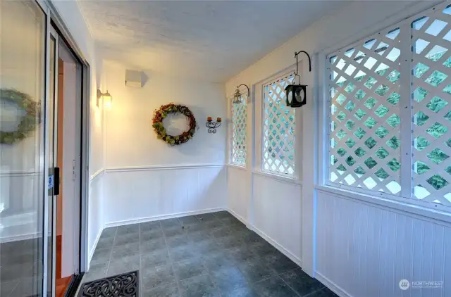 Enclosed porch just off the dining room