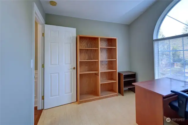 Bonus room has a large arched window that faces the cul de sac