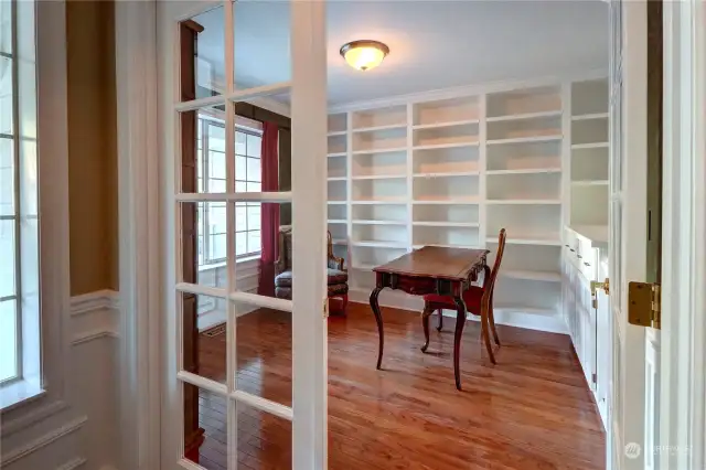 Wonderful, custom built bookcases and cabinets in the den